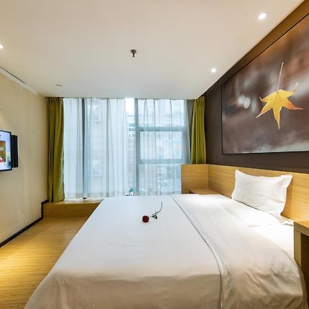Iu Hotel Chongqing Jiefangbei Exterior foto